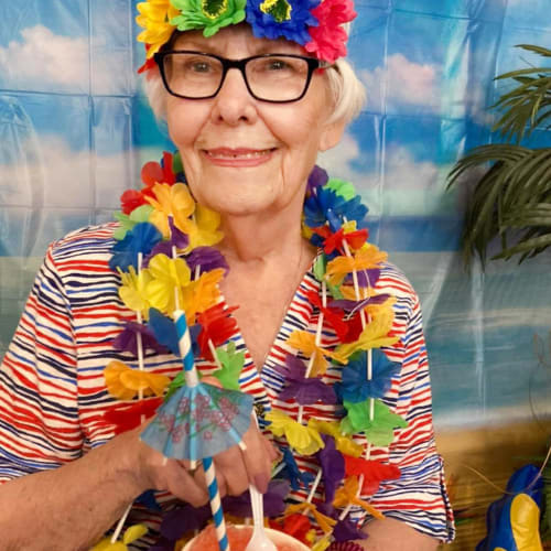 Resident with a drink at Canoe Brook Assisted Living in Duncan, Oklahoma