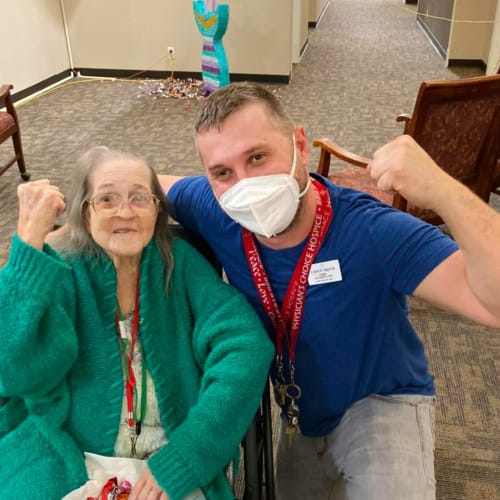 Resident with team member showing strength at Canoe Brook Assisted Living in Broken Arrow, Oklahoma
