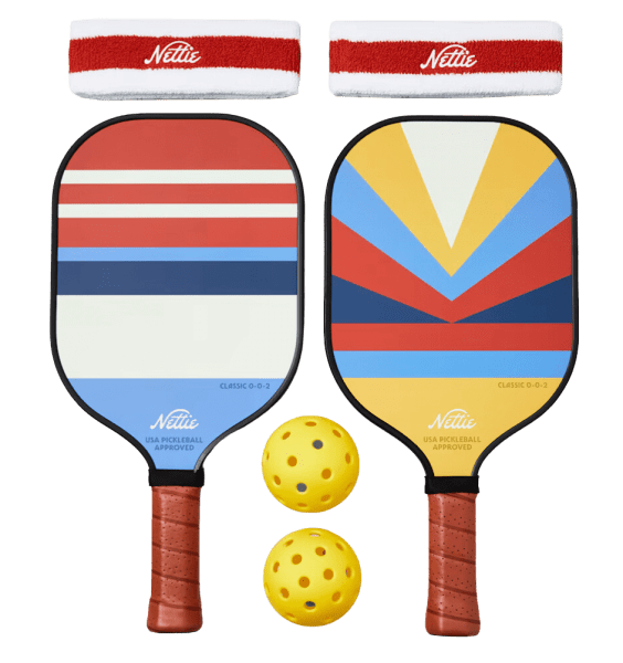 Two colorful, retro paddles, two yellow balls, and two red, and white sweatbands 