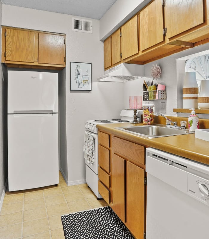 Kitchen with granite countertops at Silver Springs Apartments in Wichita, Kansas