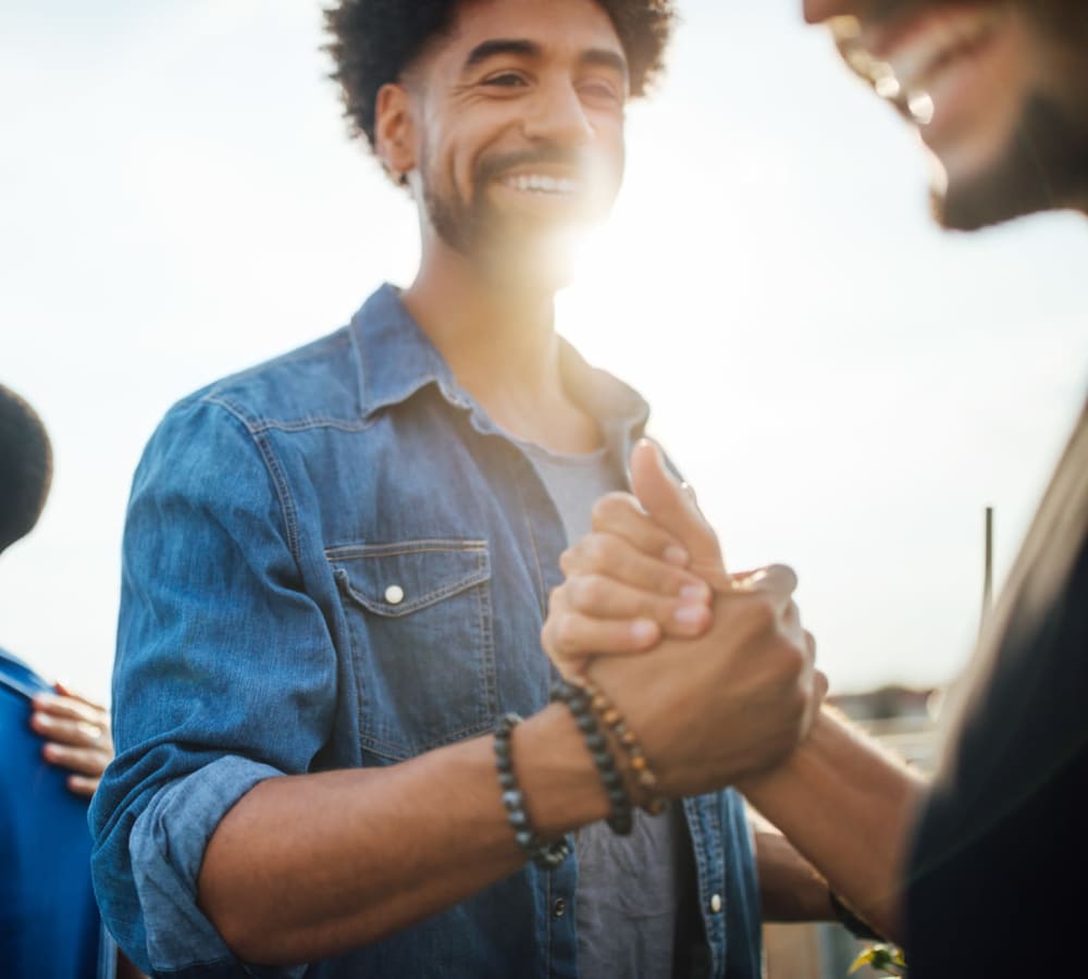 Residents greeting friends at Graham Residential in Miami Lakes, Florida