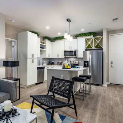 Cute dining room area with hardwood flooring at Jade at North Hyde Park in Tampa, Florida