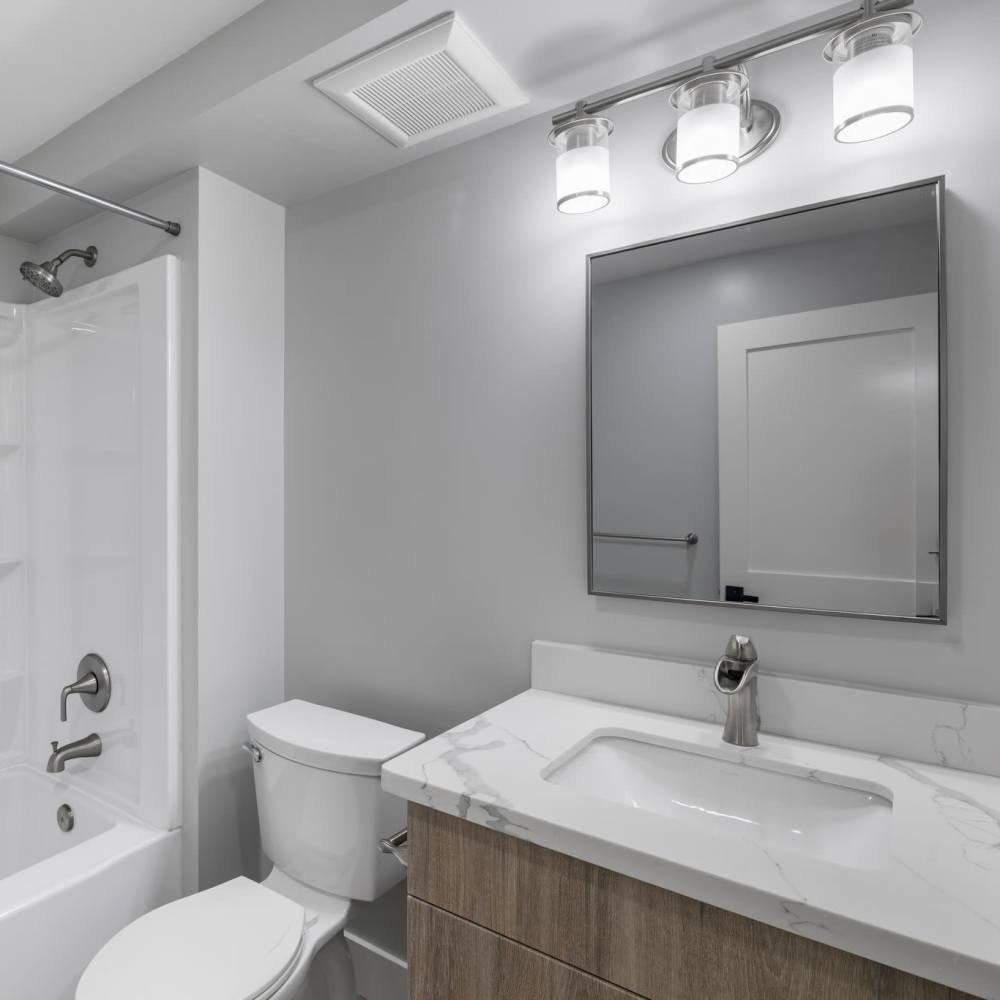 Bathroom with vanity unit at Crossbrook Apartments in Rohnert Park, California