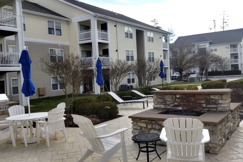 Courtyard with fire pit at Park Villas Apartments in Lexington Park, Maryland