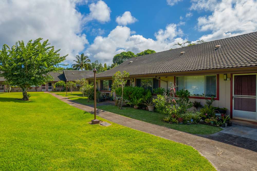 Building exterior view  grass lawn at Lihue Gardens Elderly in Lihue, Hawaii