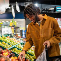 Resident shopping in a super market at Timber View Apartments in Grand Haven, Michigan