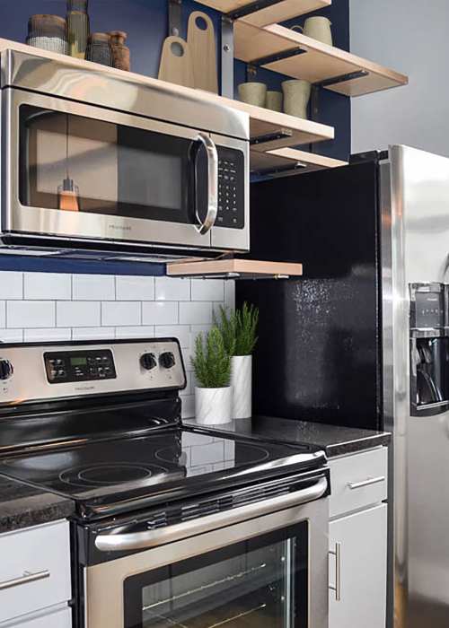 Stainless-steel appliances in an apartment kitchen at Eclipse Apartments in Richmond, Virginia