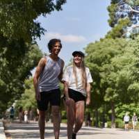 Resident couple walking in the park near The Simone in Silver Spring, Maryland