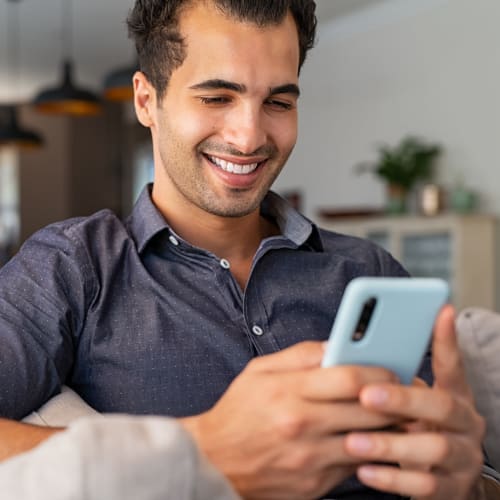 A customer paying his bill online near Red Dot Storage in Collinsville, Illinois