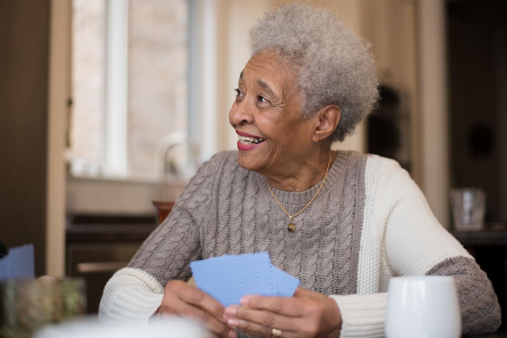 A residents playing cards at Chateau Brickyard in Salt Lake City, Utah.