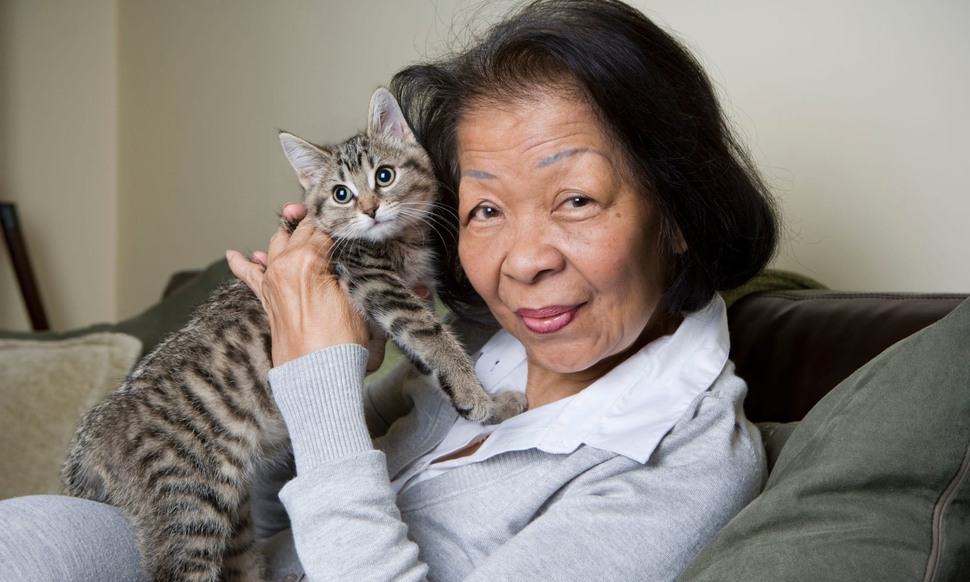 A woman and her cat at Wildcat Senior Living in Summerville, South Carolina