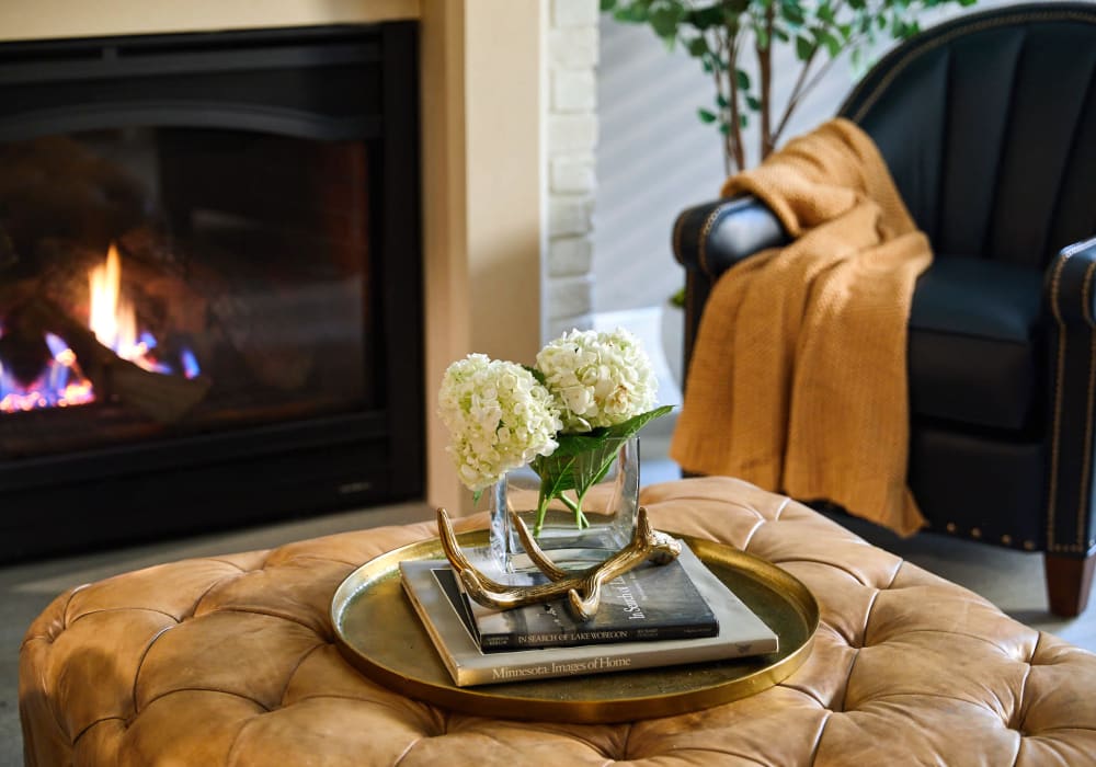 Setting with armchair and fireplace at Amira Choice in Bloomington, Minnesota