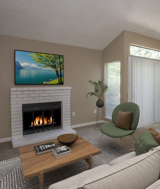Living room with fireplace at Huntcliffe Apartments in Fair Oaks, California