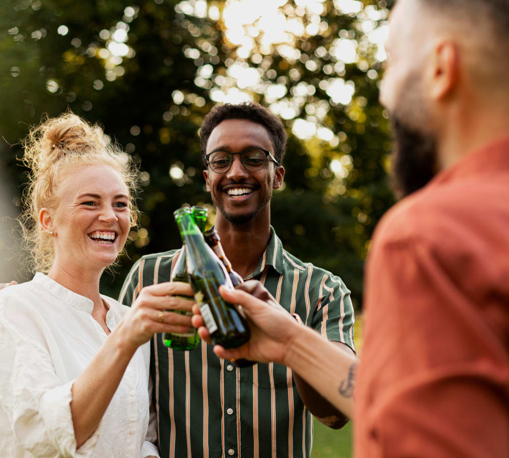 Resident friends having drinks at Montecito Apartments in Santa Clara, California