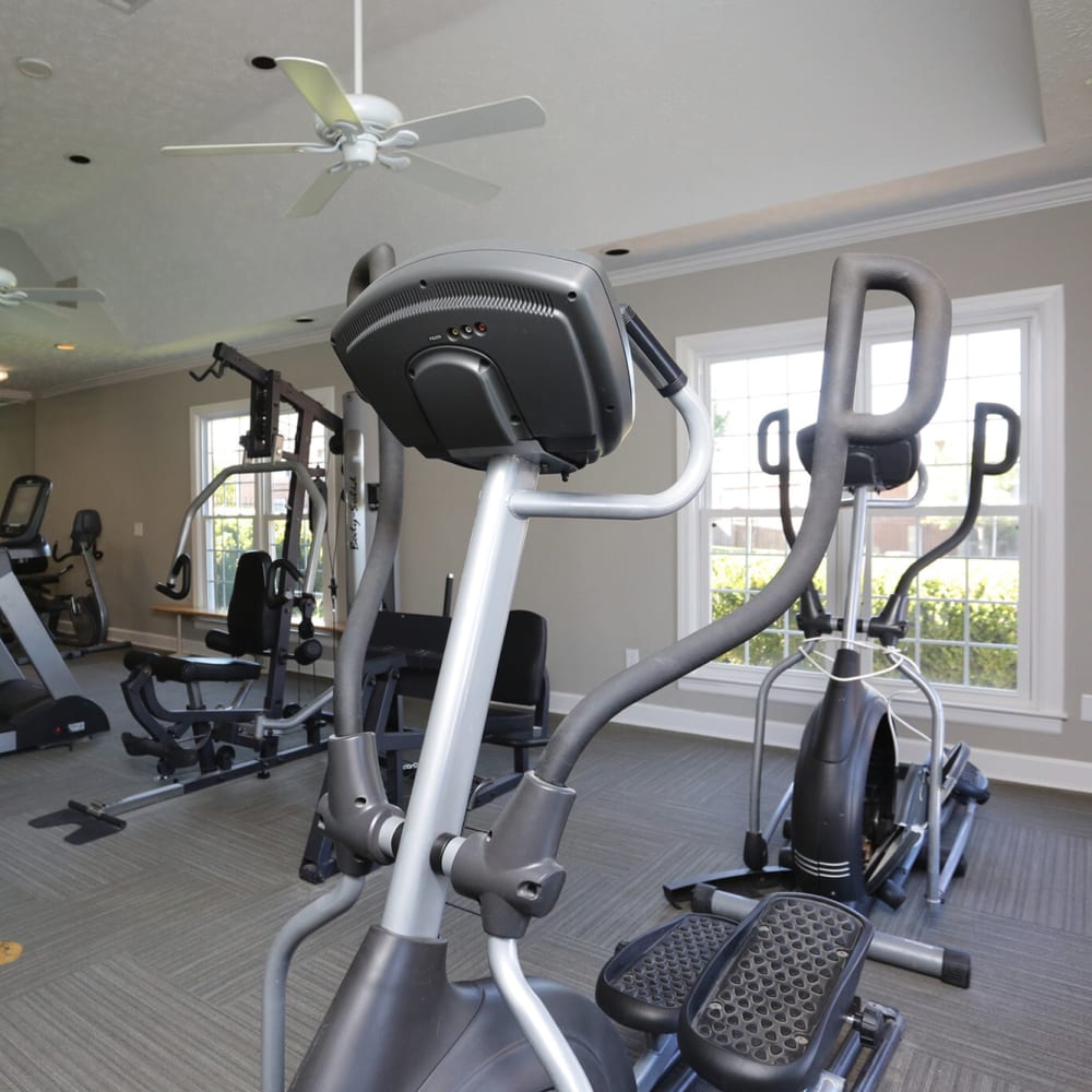 Fitness studio with treadmills and weight machines at Tapestry on Vaughn in Montgomery, Alabama