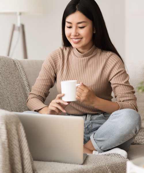 Resident woman working in her laptop at Virginia Junction in Baden, Pennsylvania