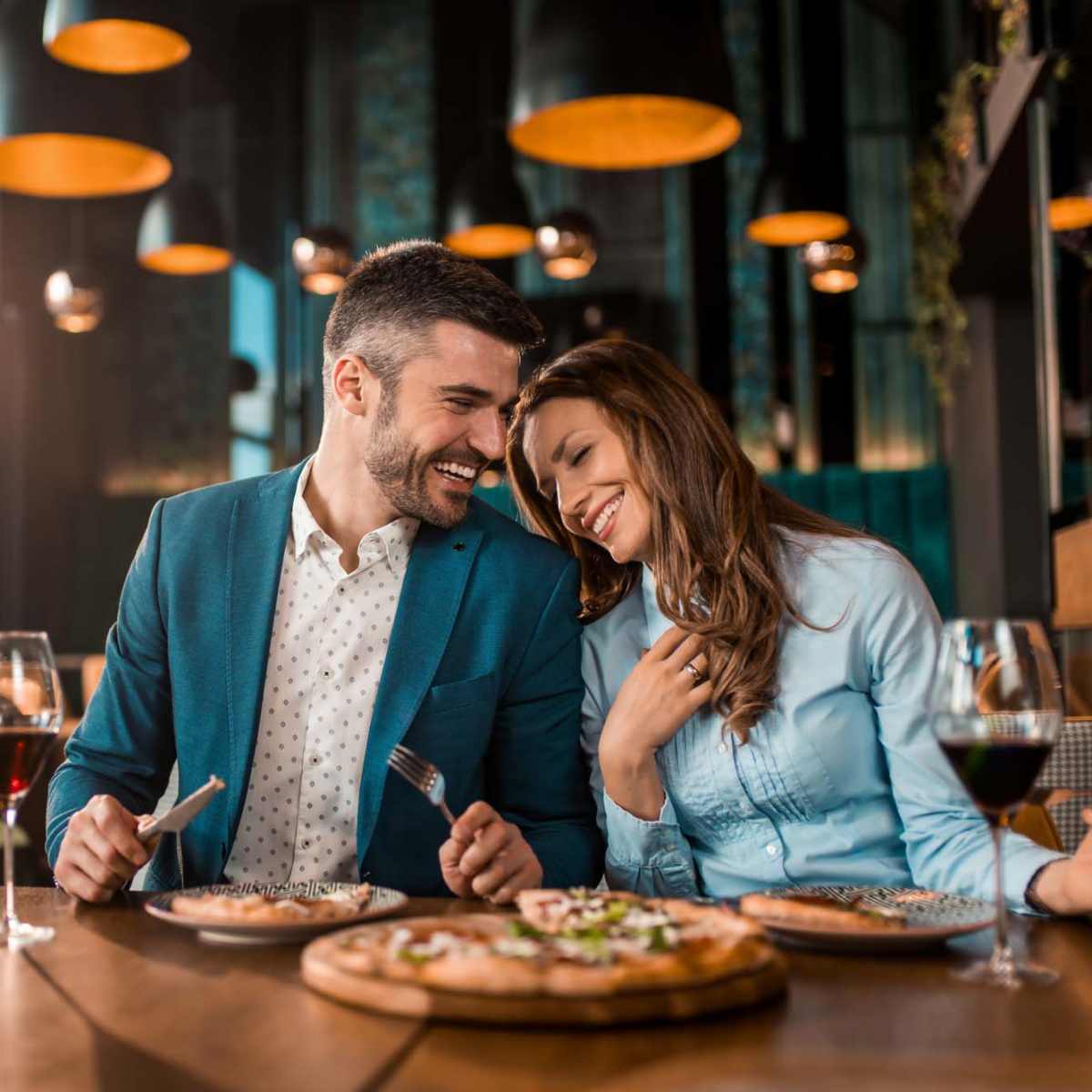 Couple enjoying food and drinks near Marks Church Commons in Augusta, Georgia