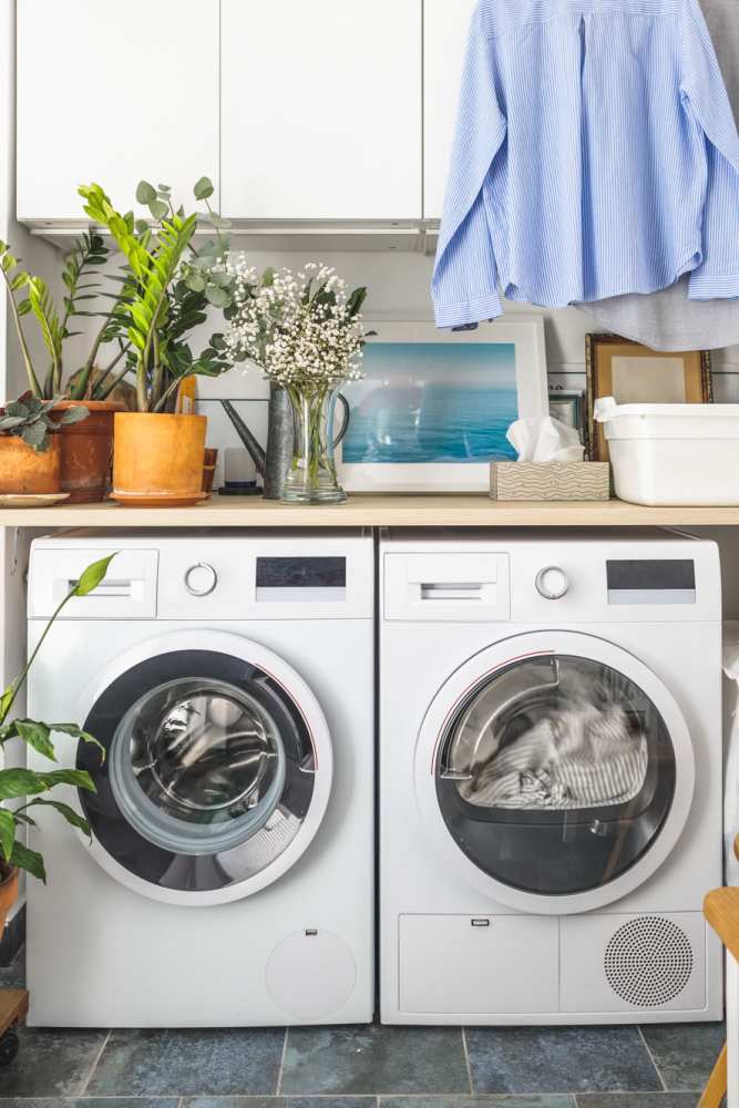 Laundry available at Arbor Park Apartments in Hurst, Texas