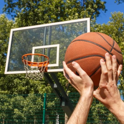 A resident playing basketball Sampson Road in Dahlgren, Virginia