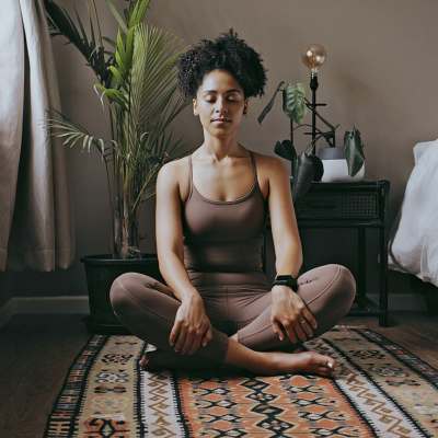Woman doing yoga at Kearney Meadows Apartments in Waunakee, Wisconsin