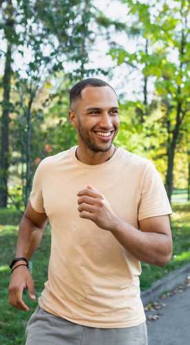 A resident man jogging at a park near The Dakota at Governors Ranch in Littleton,Colorado