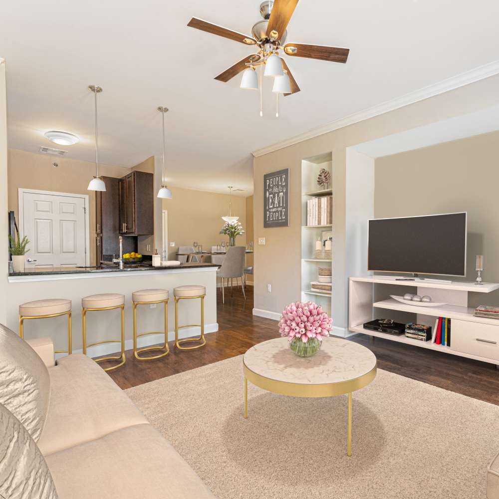 Open-concept of kitchen and living room at Boulder Springs of Columbia in Columbia,Missouri