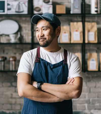 Employee at a coffee shop near Gateway Plaza Apartments in Portland, Oregon