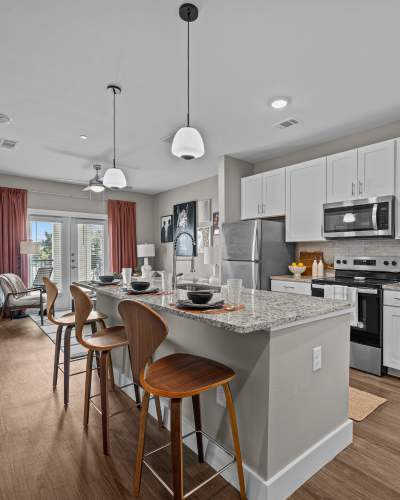Spacious living room and kitchen at Cavalry at Liberty Hill in Georgetown, Texas