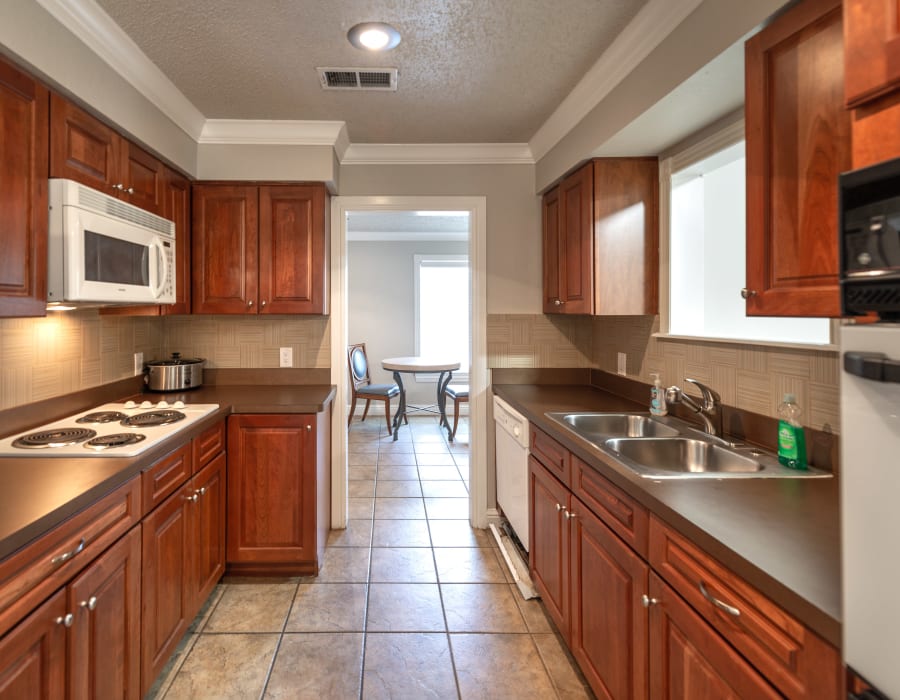 Large kitchen with dishwasher at 8500 Harwood Apartment Homes in North Richland Hills, Texas