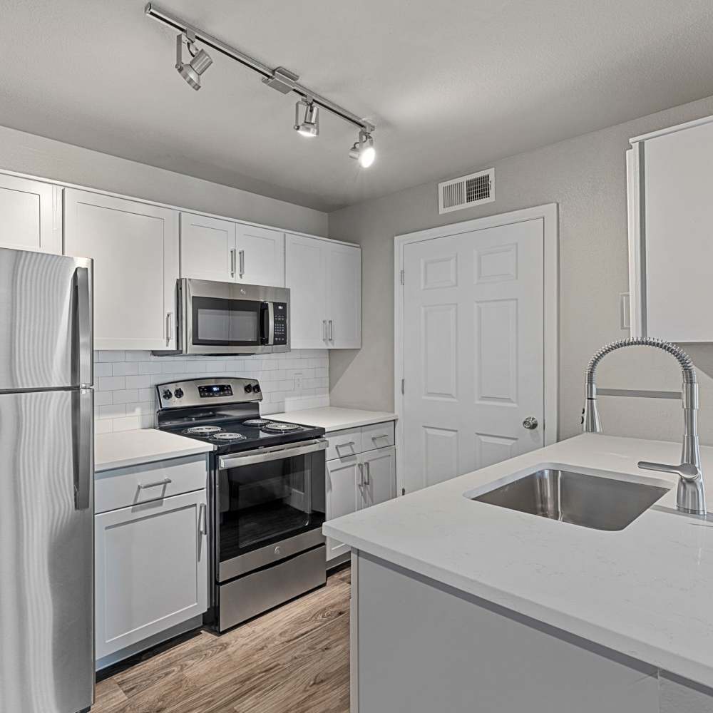 Fully equipped kitchen with appliances at Modena in Phoenix, Arizona