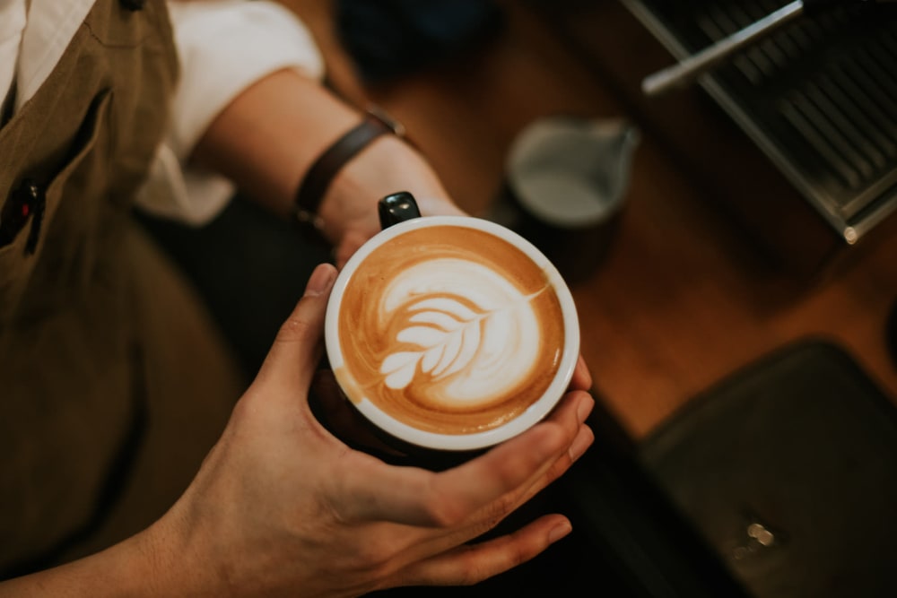 A latte at Saving Monday Coffee near The Planet in Toronto, Ontario