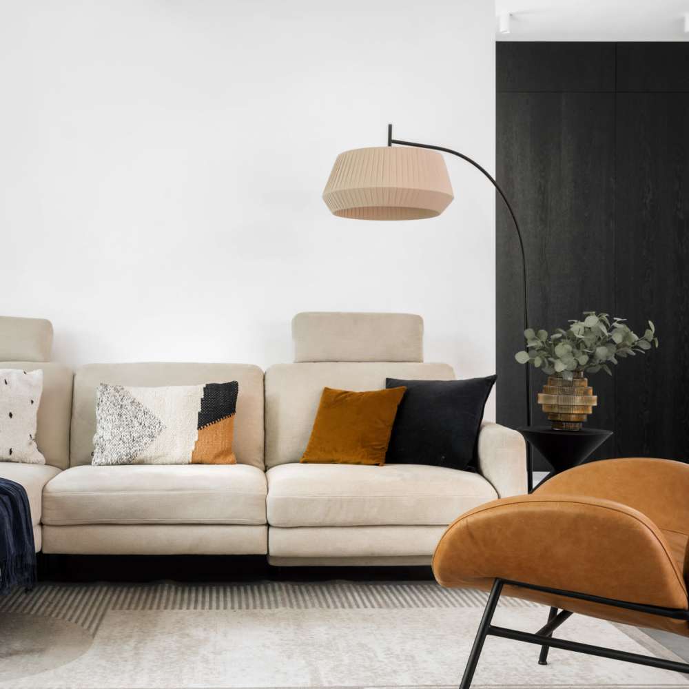 Cozy living room with a couch at Astraea at Loretto Heights in Denver, Colorado