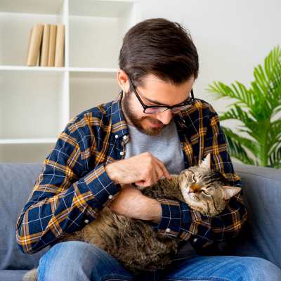 Resident and his cat in thier living room at Lakeview in Reno, Nevada