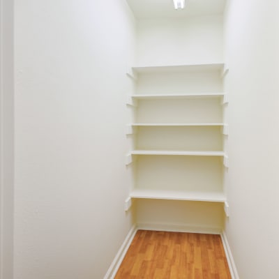 A closet with built in shelves at Midway Manor in Virginia Beach, Virginia