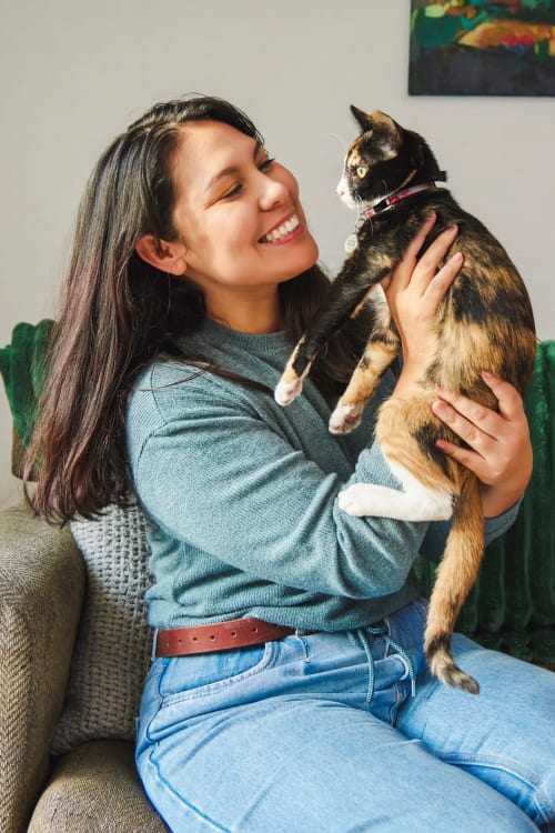 Resident holding up their cat at Parallel 36 at Jailette in Atlanta, Georgia