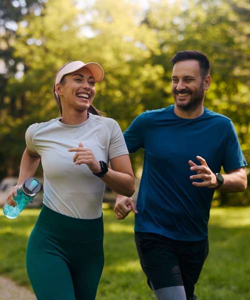 Residents jogging in park near Hunters Run in Gainesville, Florida