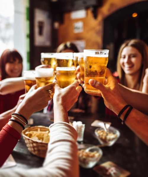 Friends having drink at a restaurant at Walker Landing in Aurora, Colorado, 