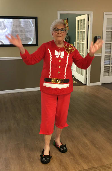 A Barkley Place resident gets in the party spirit as she wears a Christmas themed sweater!