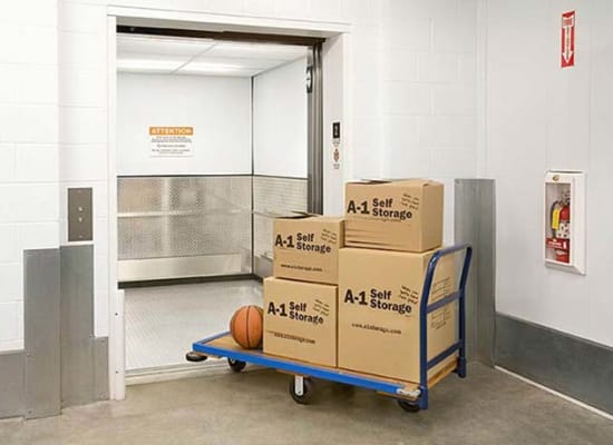 Large elevator and a cart at A-1 Self Storage in San Diego, California