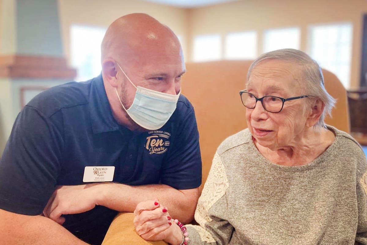 A team member helping a resident at Oxford Senior Living in Wichita, Kansas