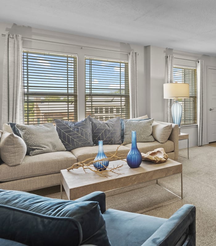 Carpeted living room at Cottages at Crestview in Wichita, Kansas