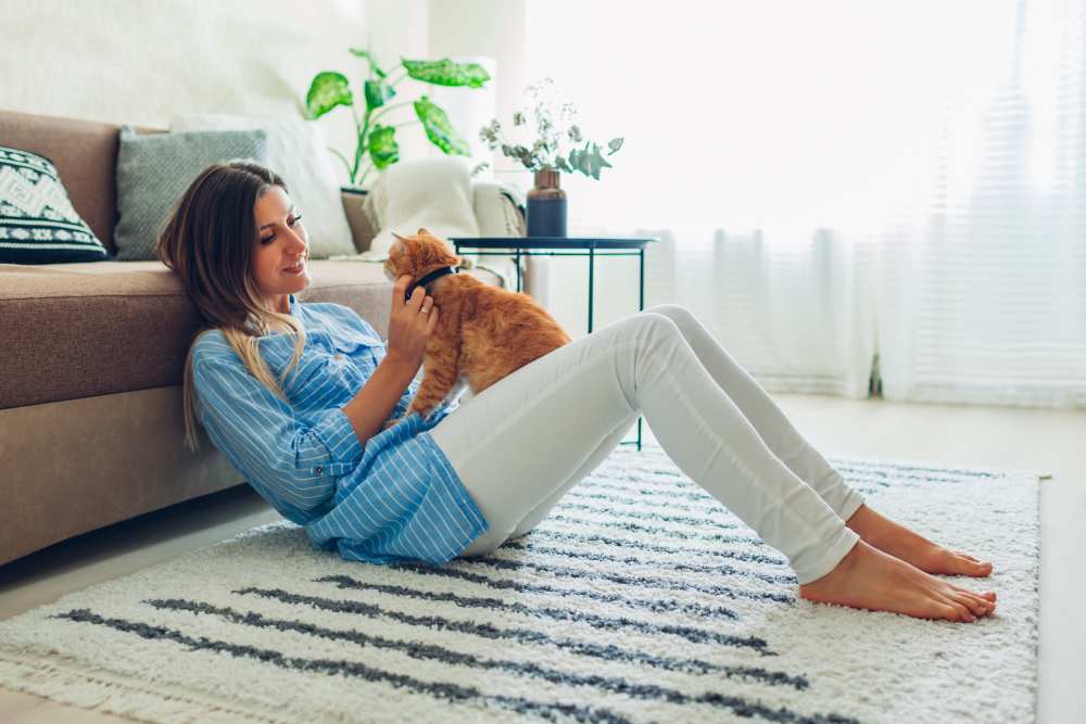 Resident playing with her cat at Palmer in Waldorf, Maryland
