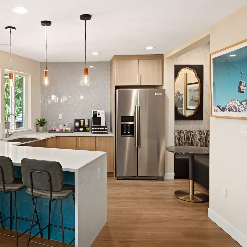 Kitchen with blue accents The Summit in Redmond, Washington