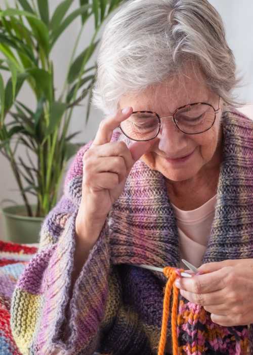 Resident knitting at Silver Creek in St. Augustine, Florida