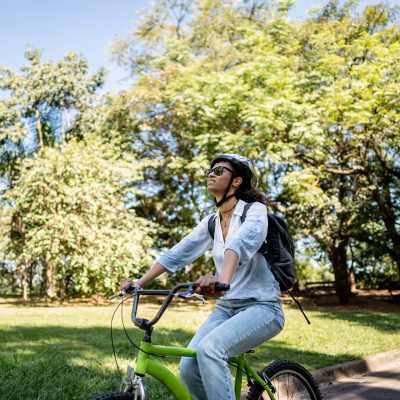 Resident going to office by bicycle near Luxe Villas in Brentwood, California 