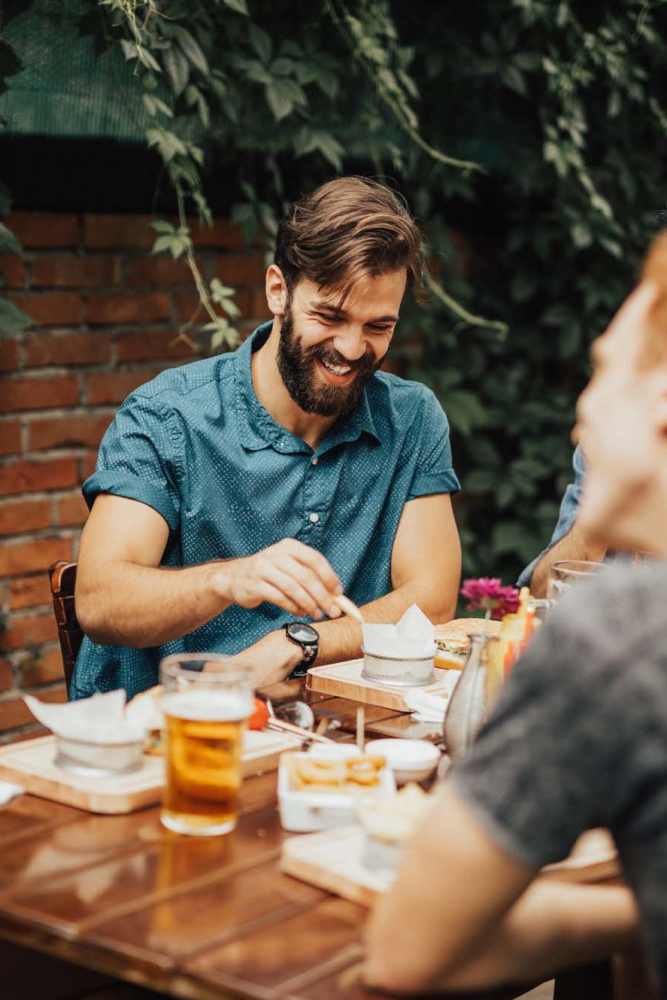 Residents having delicious food at a restaurant near Pine Lake Village in Houston, Texas