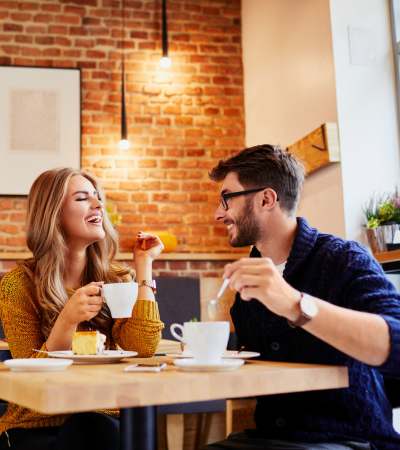 Residents having coffee at a favorite restaurant near The Edison at Madison in Madison, Alabama