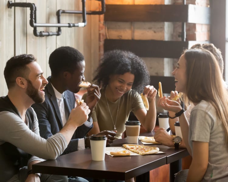 Resident friends meeting for coffee and a snack near Sofi at 3rd in Long Beach, California