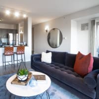Spacious living room at 415 Premier Apartments in Evanston, Illinois
