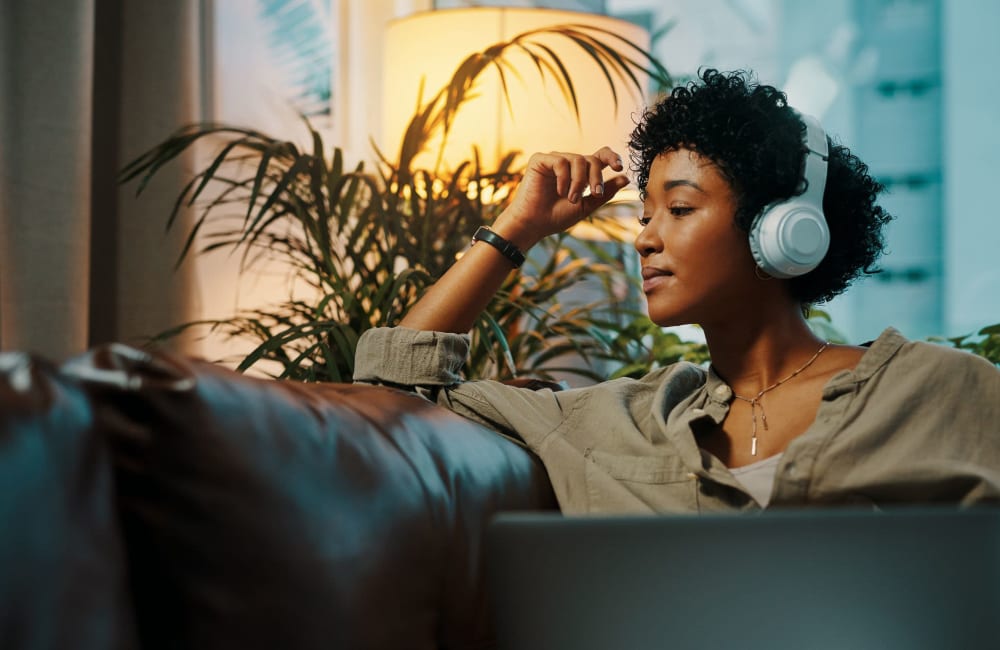 Resident listening to music at Valencia Trace in Orlando, Florida